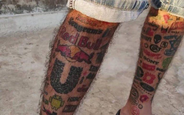 Χτύπησε 442 λογότυπα τατουάζ στο σώμα του για να μπει στα Ρεκόρ Γκίνες